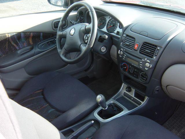 Nissan almera n16 салон